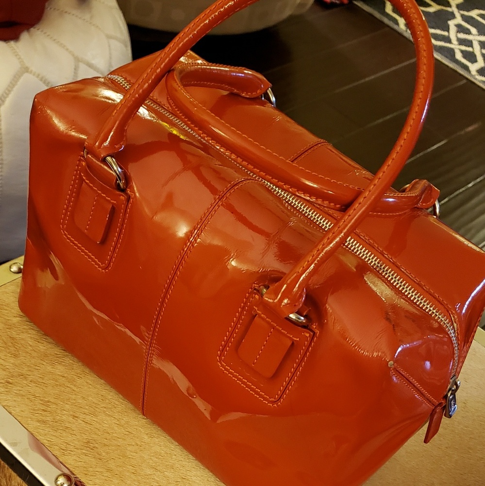 Tod's patent leather orange purse